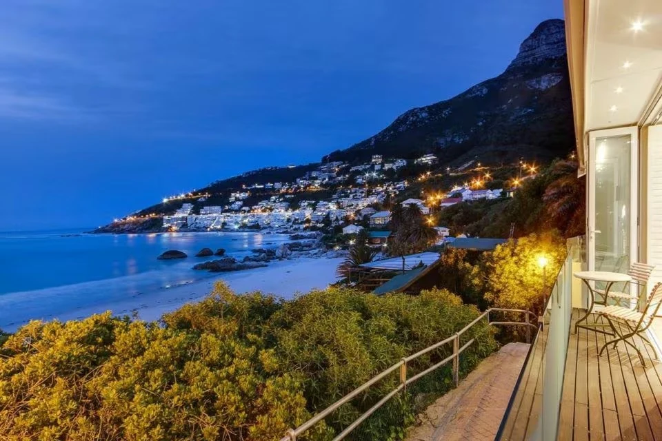 Clifton coastline illuminated at blue hour