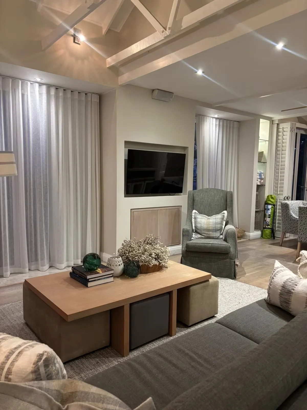 Cosy lounge and fireplace area at Bungalow 69