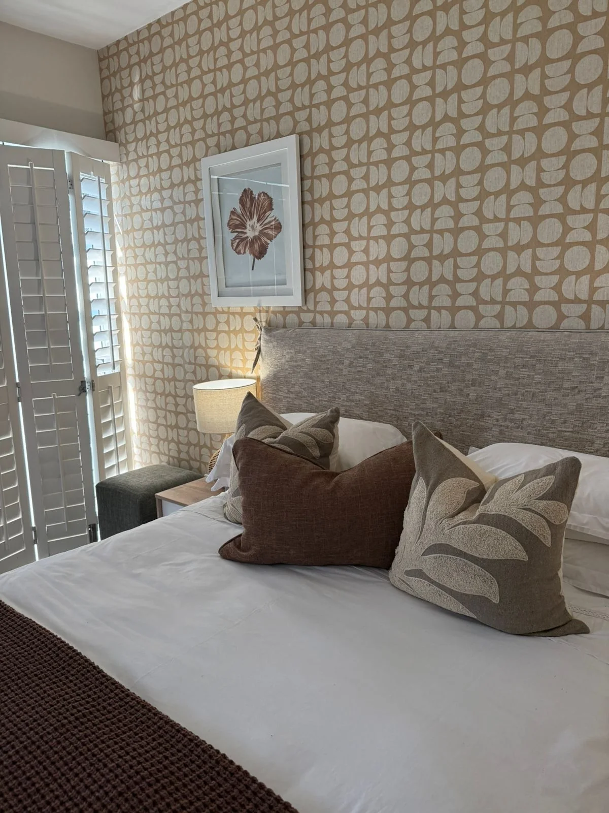 Layered cushions in the second bedroom